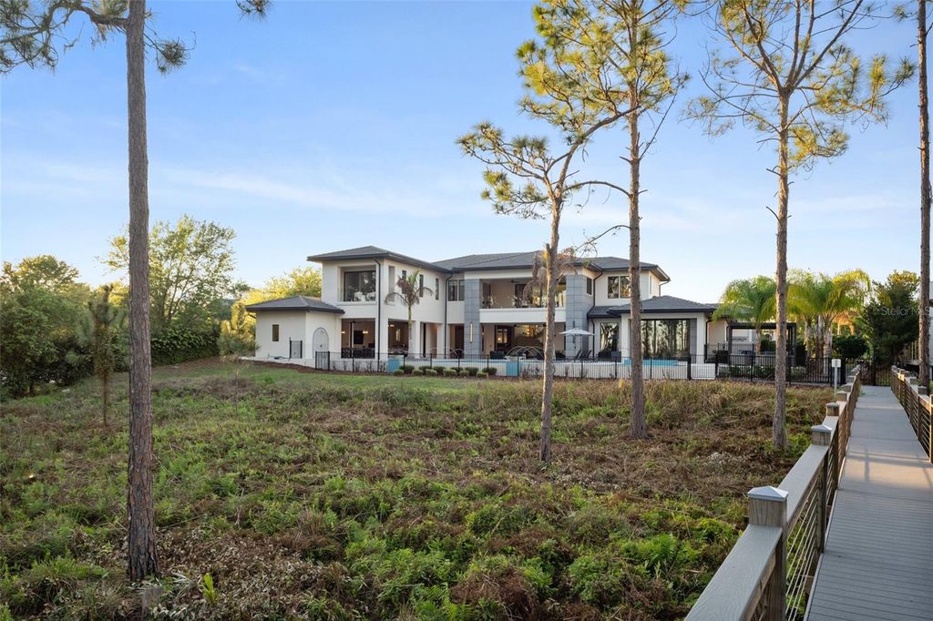 Image 76 of property listing at 8506 LAKE NONA SHORE DR, Orlando, FL 32827