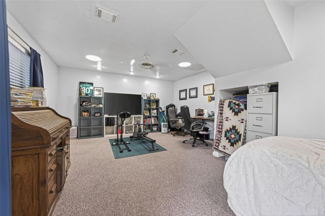 9818 Twin Shores Drive, Willis, TX 77318