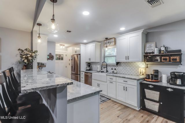 8707 Pine Ridge Court, Diamondhead, MS 39525