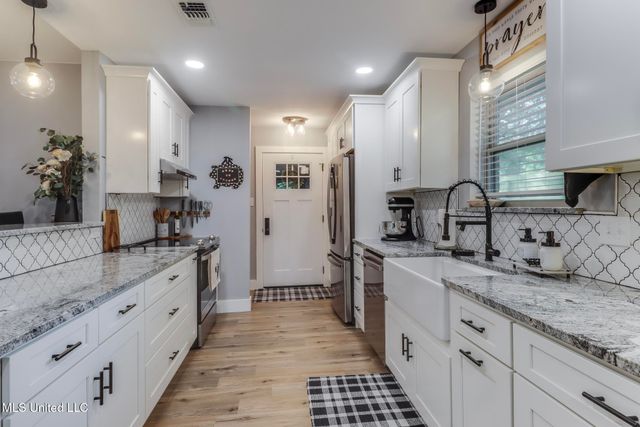 8707 Pine Ridge Court, Diamondhead, MS 39525