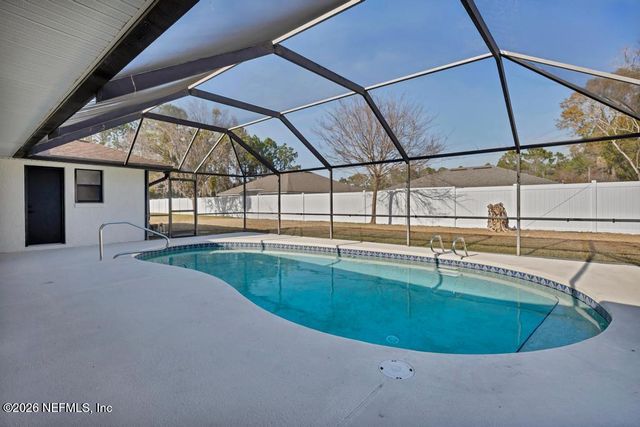 7 BIRD LAND Place, Palm Coast, FL 32137