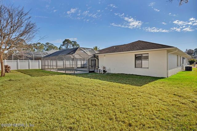 7 BIRD LAND Place, Palm Coast, FL 32137