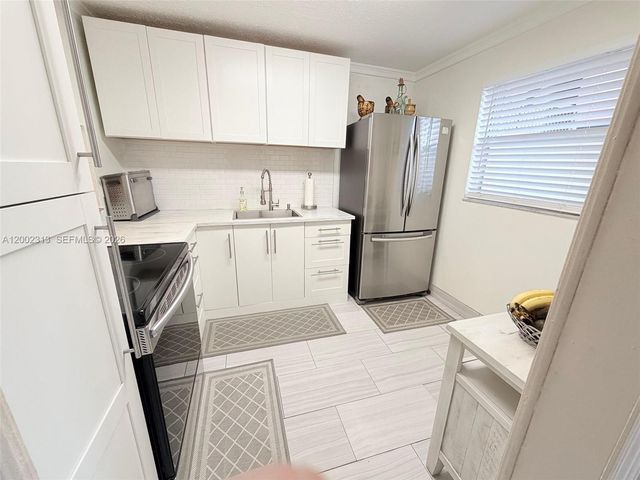 3040 Holiday Springs Boulevard 110, Margate, FL 33063