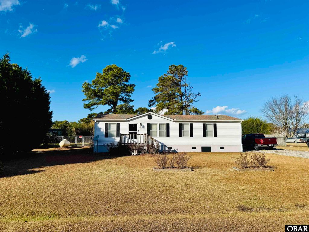 Image 1 of property listing at 131 Edgewater Drive Lot 16, Grandy, NC 27939