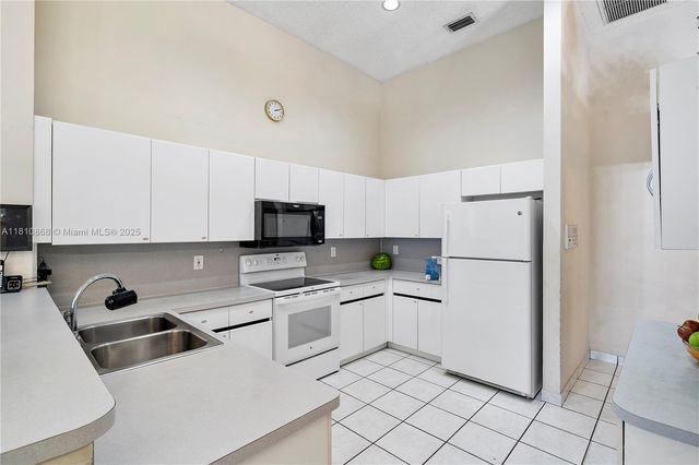 1357 Camellia Ln, Weston, FL 33326