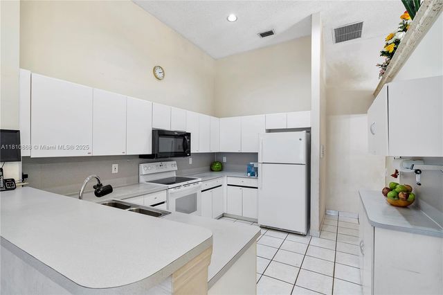 1357 Camellia Ln, Weston, FL 33326