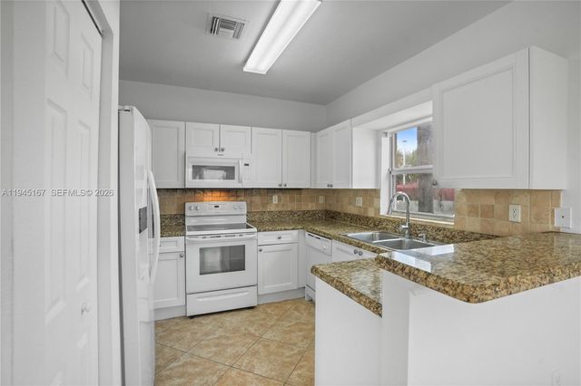 501 Talia Circle, Palm Springs, FL 33461