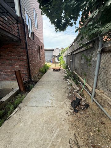 9430 Albert Road, Ozone Park, NY 11417