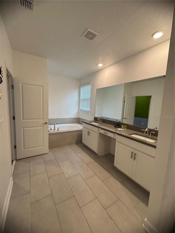 8973 PLAY THROUGH DRIVE, Davenport, FL 33896