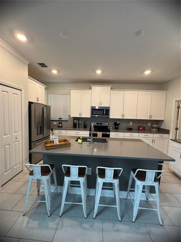 8973 PLAY THROUGH DRIVE, Davenport, FL 33896