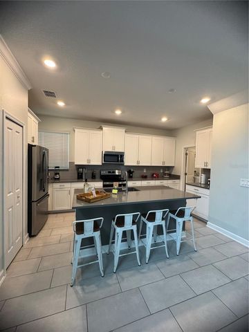 8973 PLAY THROUGH DRIVE, Davenport, FL 33896