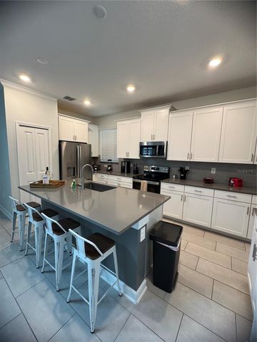 8973 PLAY THROUGH DRIVE, Davenport, FL 33896