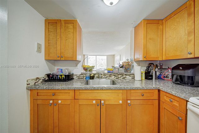 494 NW 165th St Rd C-205, Miami, FL 33169