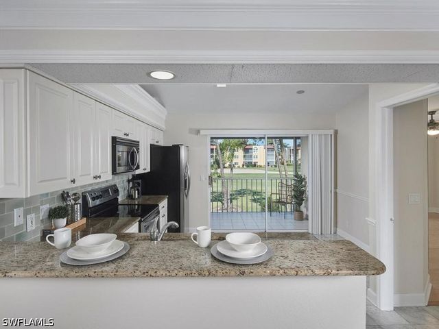 267 Quail Forest BLVD 209, Naples, FL 34105