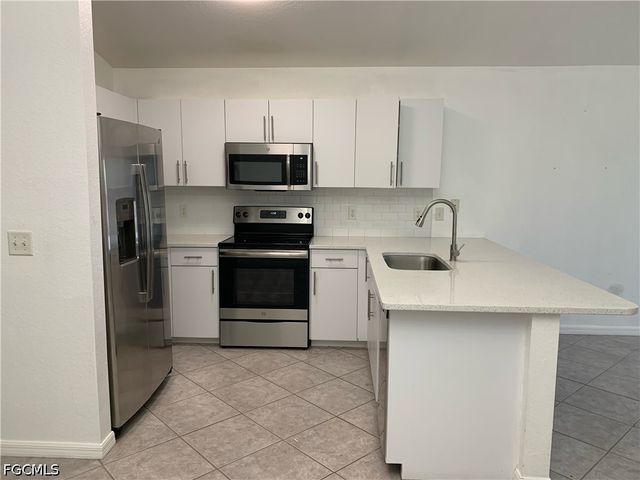 1242 SE 24th AVE, Cape Coral, FL 33990