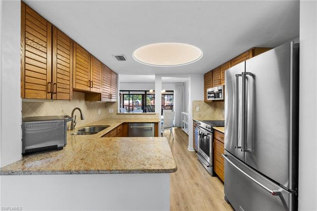 6710 Pelican Bay BLVD 422, Naples, FL 34108
