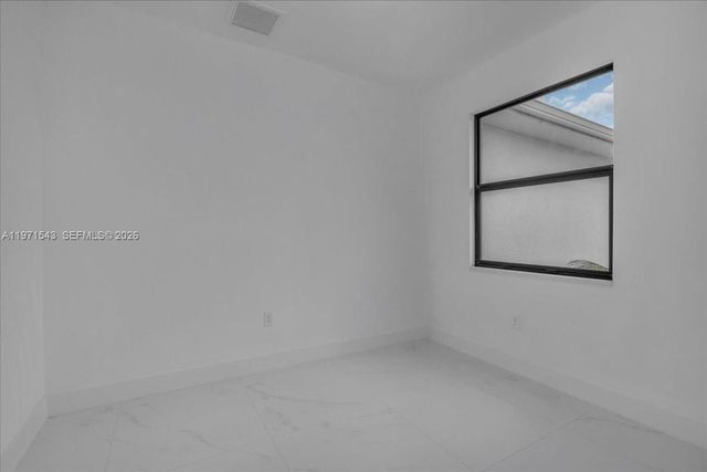 1201 JOHNS AVE, Lehigh Acres, FL 33909