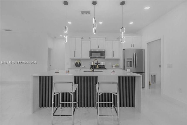 1201 JOHNS AVE, Lehigh Acres, FL 33909