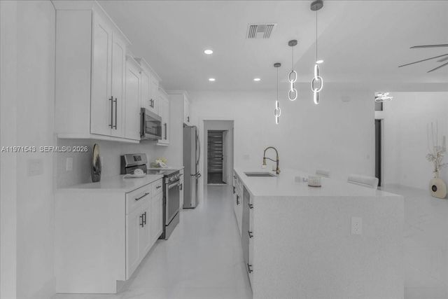 1201 JOHNS AVE, Lehigh Acres, FL 33909