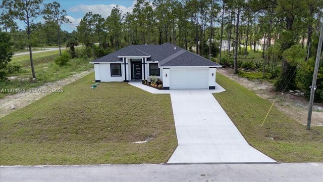 1201 JOHNS AVE, Lehigh Acres, FL 33909