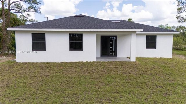 1201 JOHNS AVE, Lehigh Acres, FL 33909