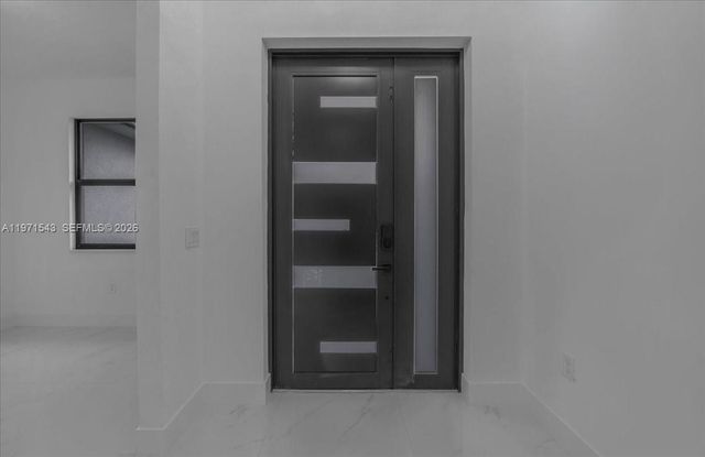 1201 JOHNS AVE, Lehigh Acres, FL 33909