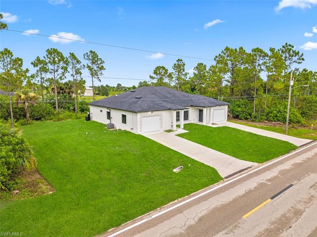 318 W 12th ST, LEHIGH ACRES, FL 33972 — photo 2