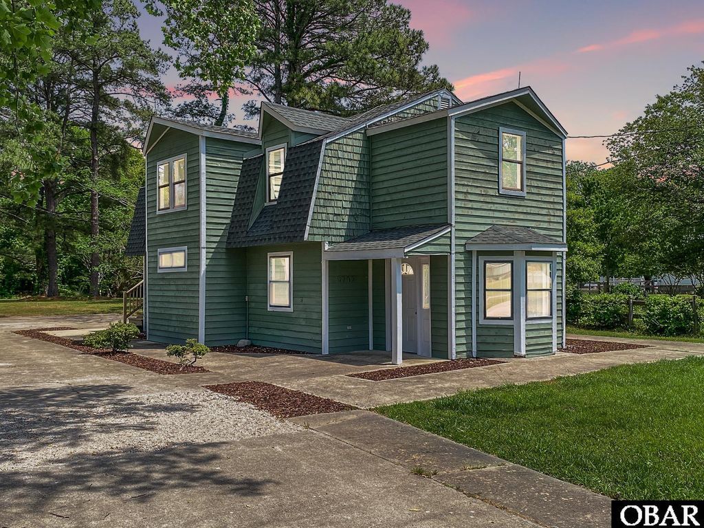 Image 1 of property listing at 5707 Caratoke Highway, Poplar Branch, NC 27965