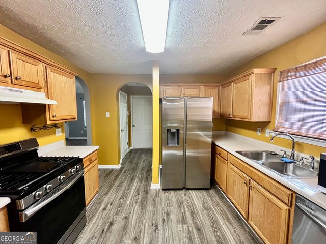 6135 Stone Creek Lane, Rex, GA 30273