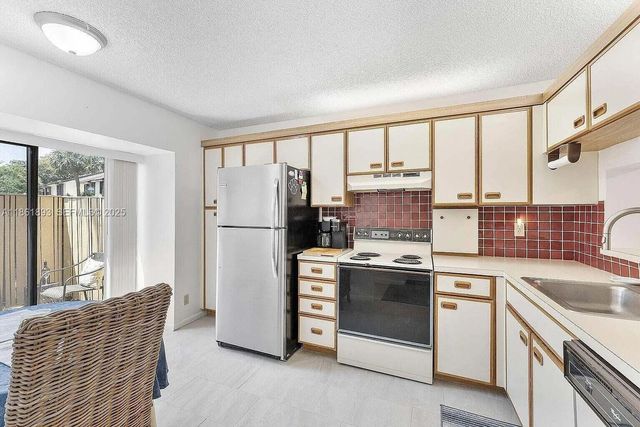4575 S Carambola S Circle 27206, Coconut Creek, FL 33066