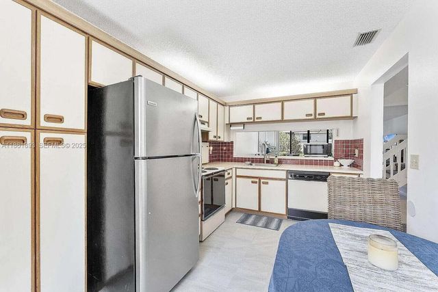 4575 S Carambola S Circle 27206, Coconut Creek, FL 33066