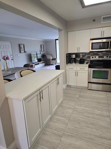 7580 Regency Lake Drive 402, Boca Raton, FL 33433