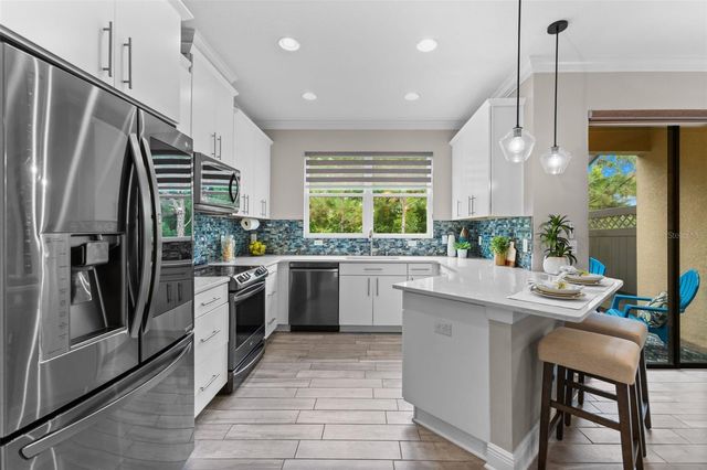 11458 CROWNED SPARROW LANE, Tampa, FL 33626