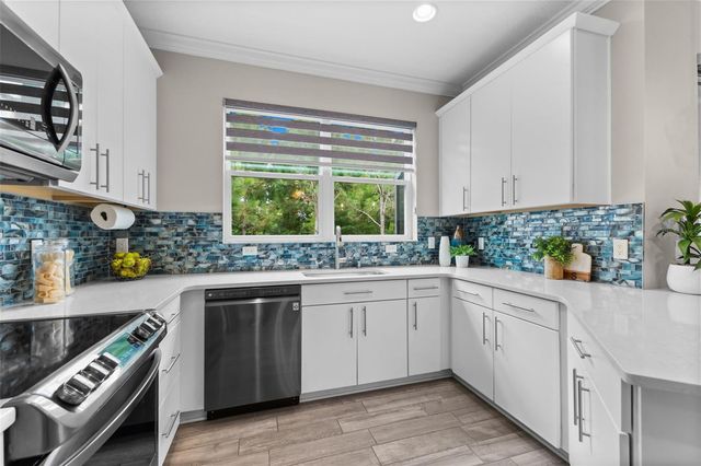 11458 CROWNED SPARROW LANE, Tampa, FL 33626