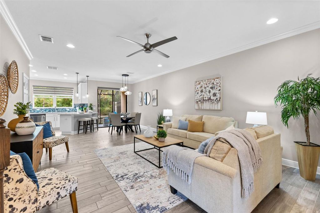 Image 3 of property listing at 11458 CROWNED SPARROW LANE, Tampa, FL 33626