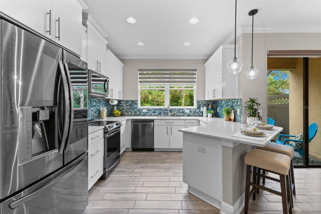 Image 7 of property listing at 11458 CROWNED SPARROW LANE, Tampa, FL 33626