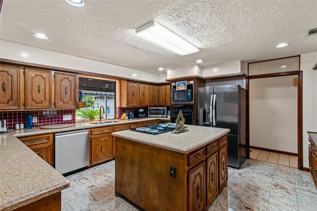 319 S Rivershire Drive, Conroe, TX 77304