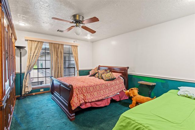 319 S Rivershire Drive, Conroe, TX 77304
