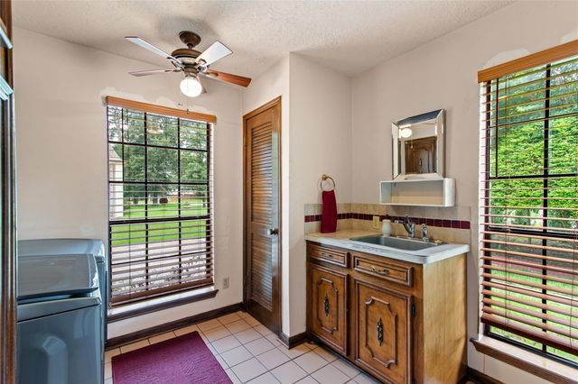 319 S Rivershire Drive, Conroe, TX 77304