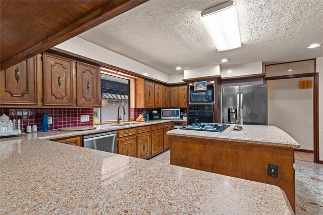319 S Rivershire Drive, Conroe, TX 77304