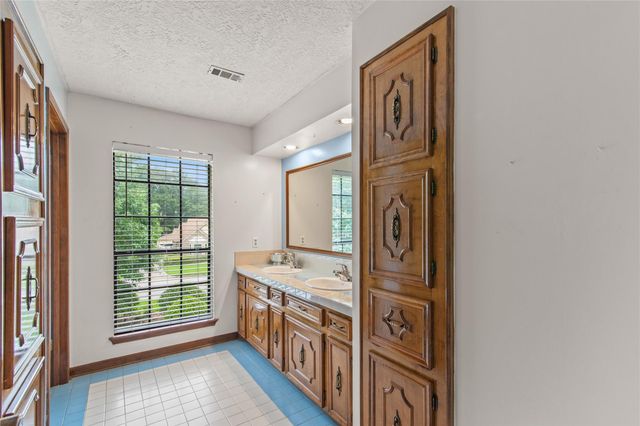 319 S Rivershire Drive, Conroe, TX 77304