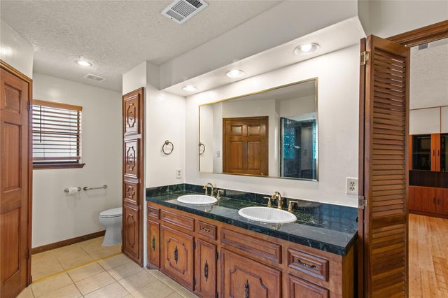319 S Rivershire Drive, Conroe, TX 77304