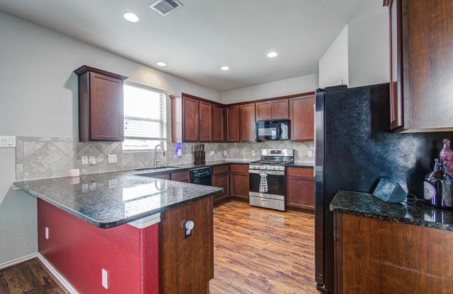 1703 Thornhampton Court, Houston, TX 77014