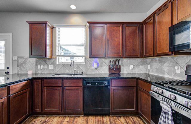 1703 Thornhampton Court, Houston, TX 77014