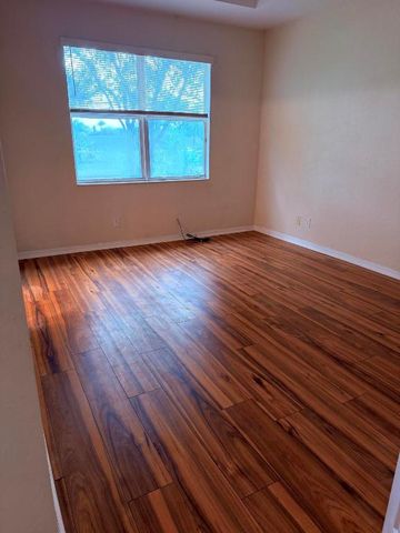 779 Pipers Cay Drive 104, West Palm Beach, FL 33415