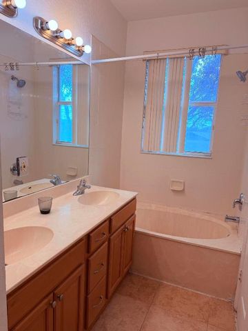 779 Pipers Cay Drive 104, West Palm Beach, FL 33415