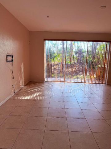 779 Pipers Cay Drive 104, West Palm Beach, FL 33415