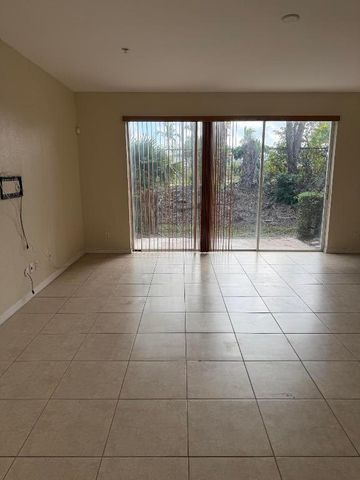 779 Pipers Cay Drive 104, West Palm Beach, FL 33415