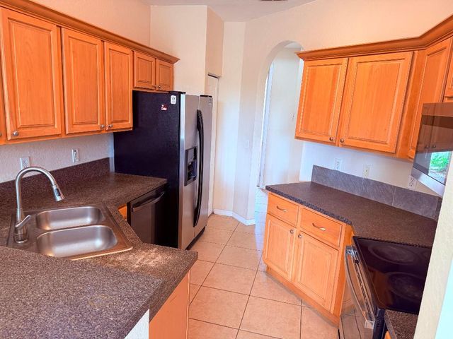 779 Pipers Cay Drive 104, West Palm Beach, FL 33415