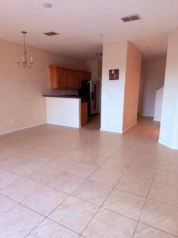 779 Pipers Cay Drive 104, West Palm Beach, FL 33415